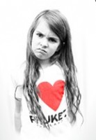Juliet Childs, 8 years old, wearing an I Love Phucket T-shirt